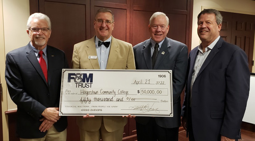Representatives from United Trust Bank and Hagerstown Community College pose for a photo with the $50,000 donation from United Trust Bank